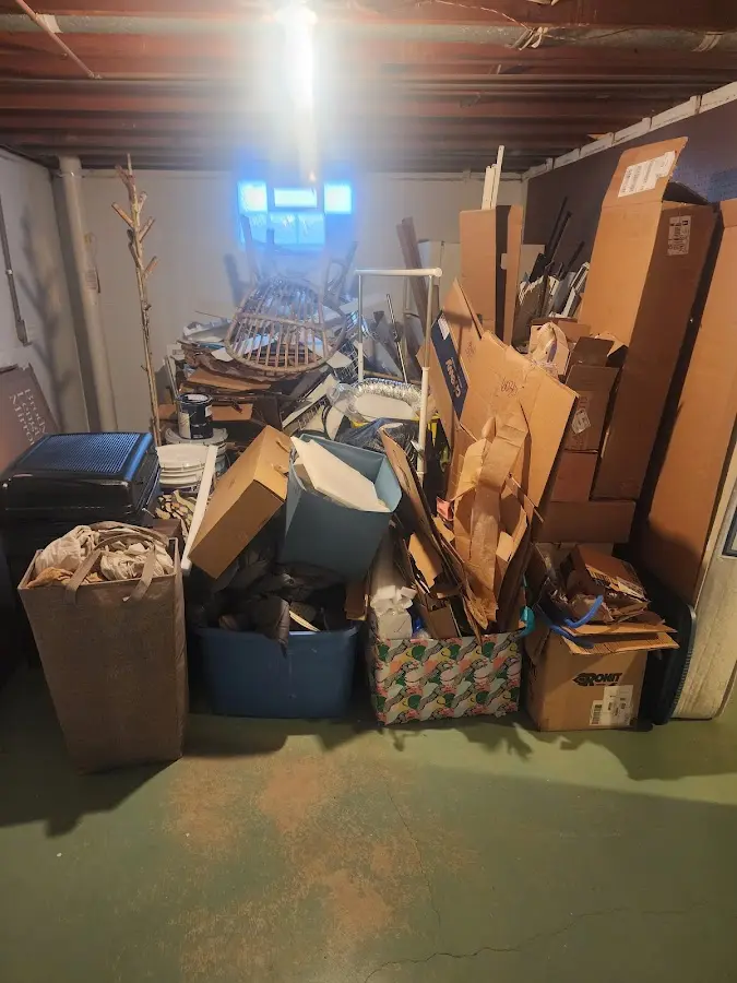 Roll-off dumpster container at job site for Cleanout Dumpster Rental in Montesano